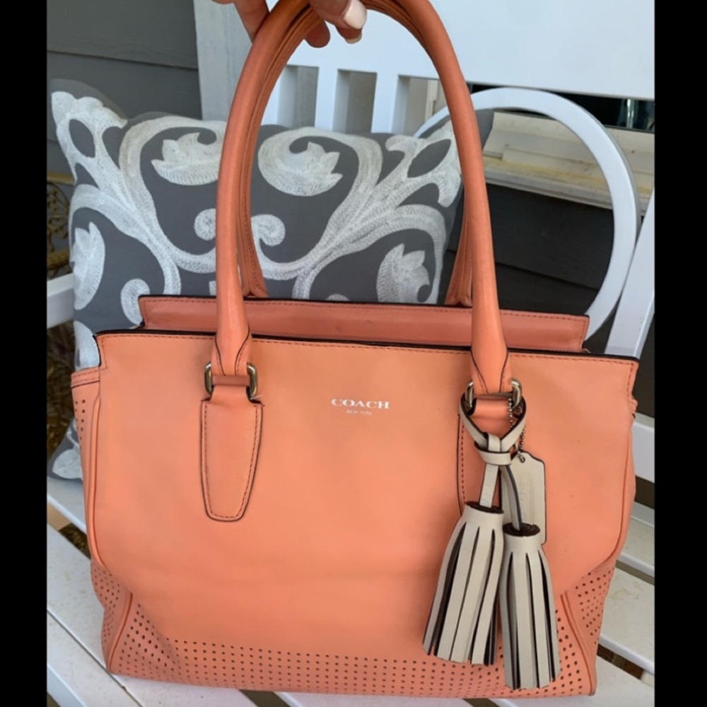 Coach Legacy perforated carryall Candice
- Genuine leather coral/peach purse💕